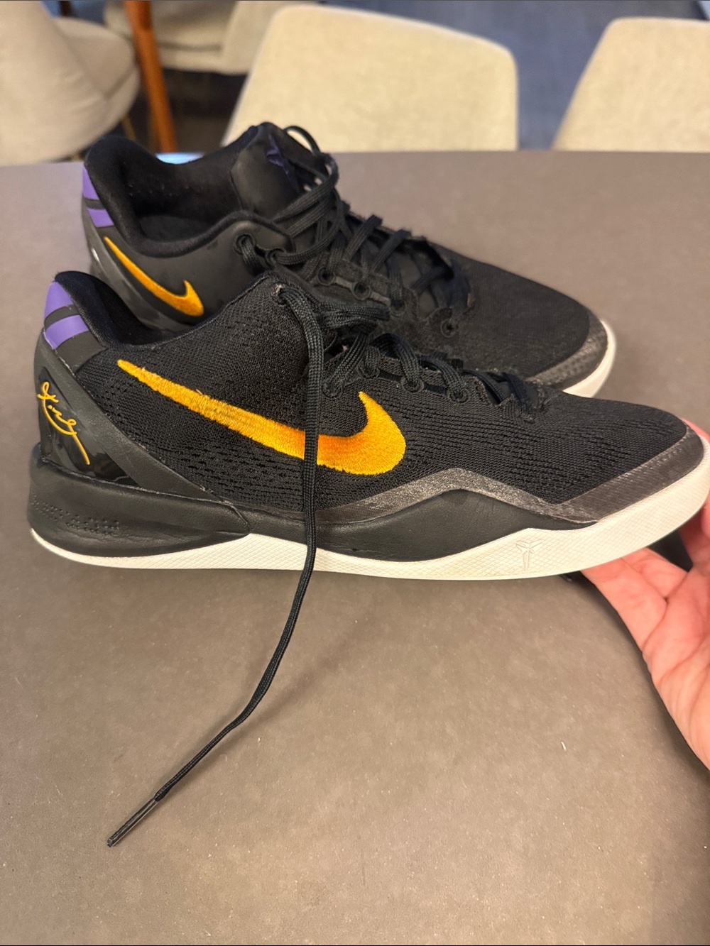 Nike Kobe Men’s Black & Gold Low-Top Basketball Sneakers with Purple Accents